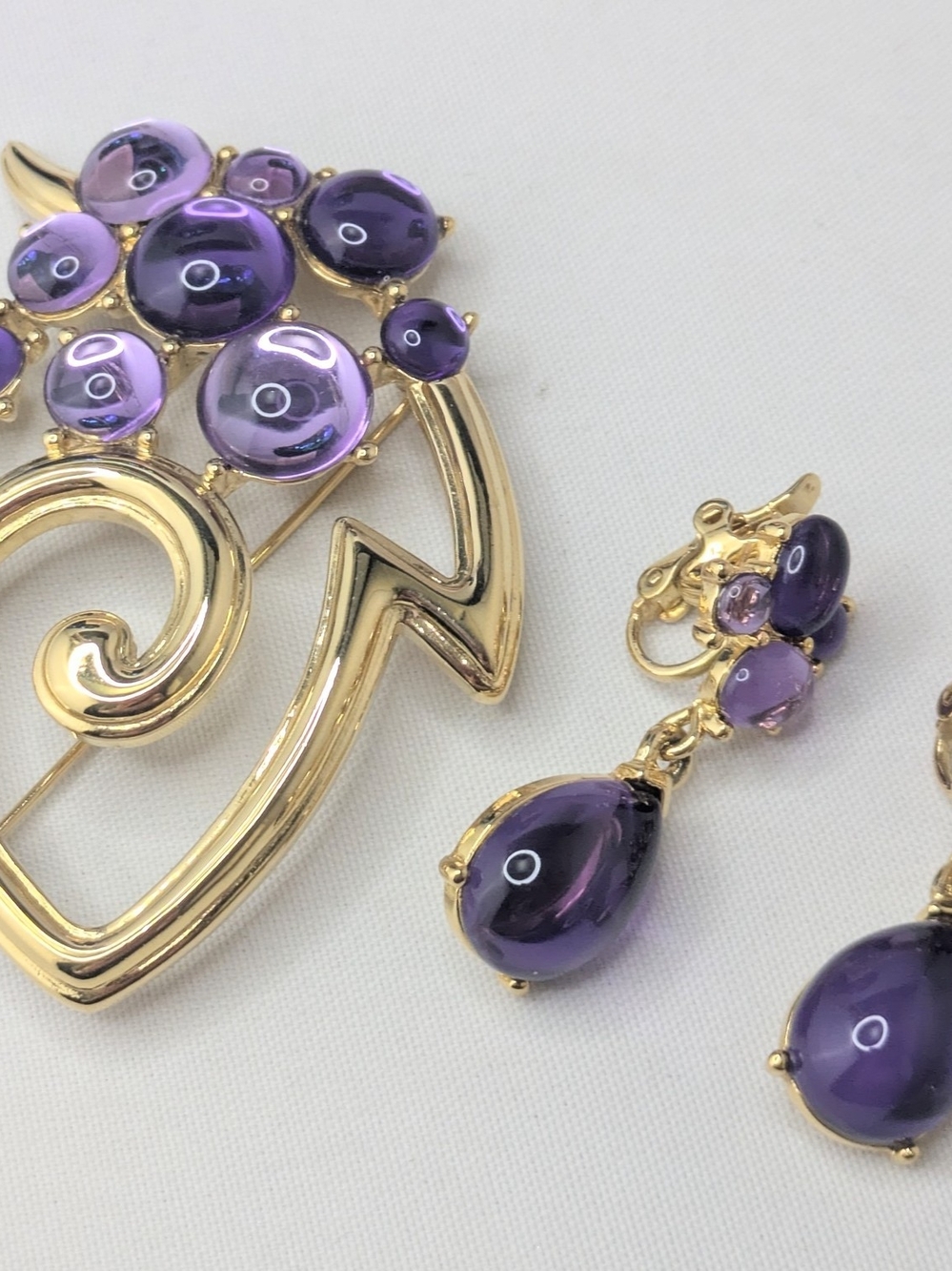 Trifari TM Gold-Tone Brooch and Clip-On Earrings with Purple Cabochons